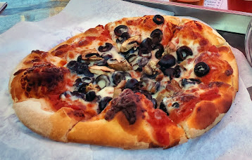 Pizza, fresh baked with toppings.